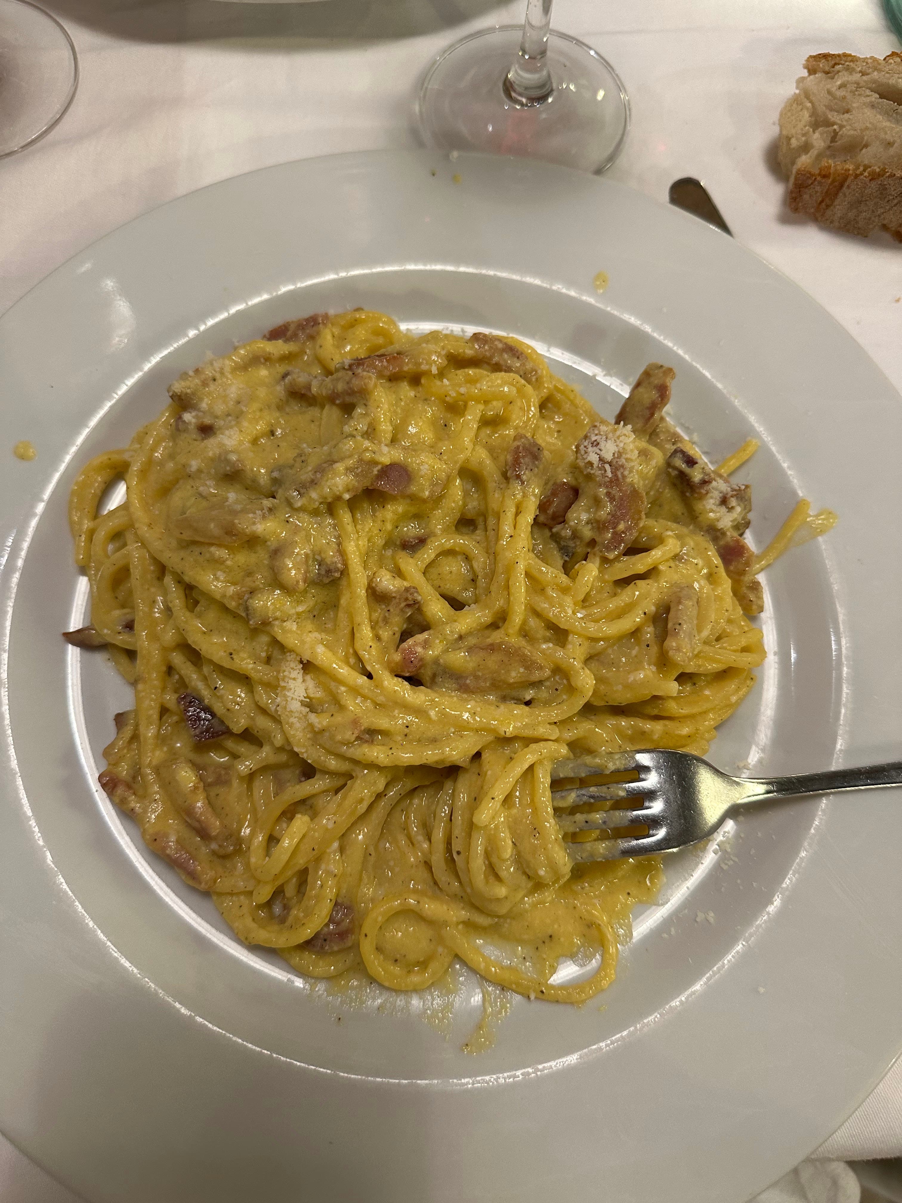 Plate of carbonara pasta eaten in Rome