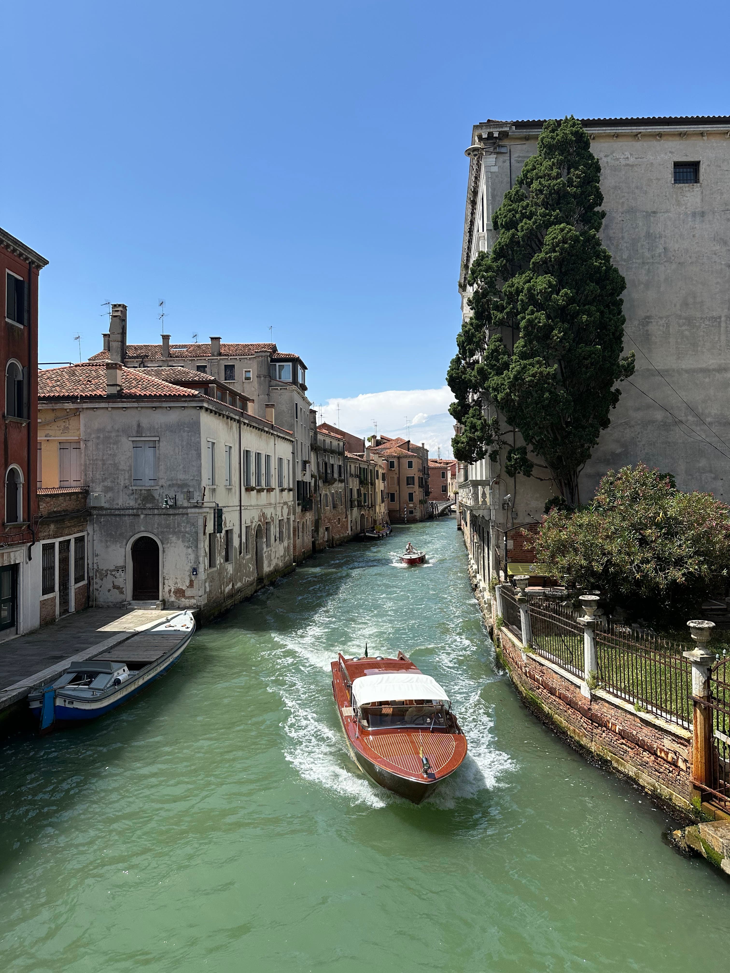 Venice canal with a boat on the water