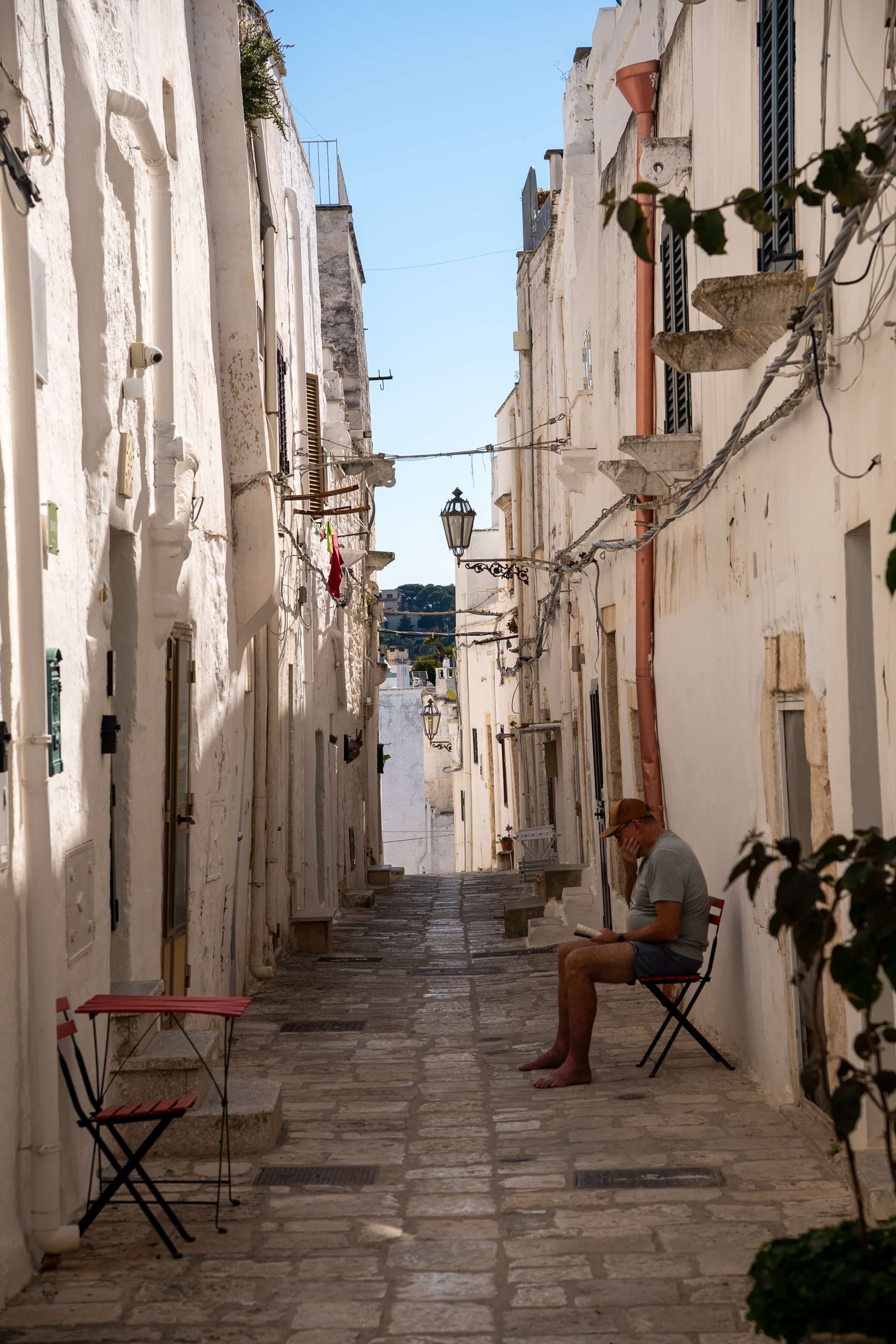 Cobbled alley and white houses of the village of Ostuni in Puglia