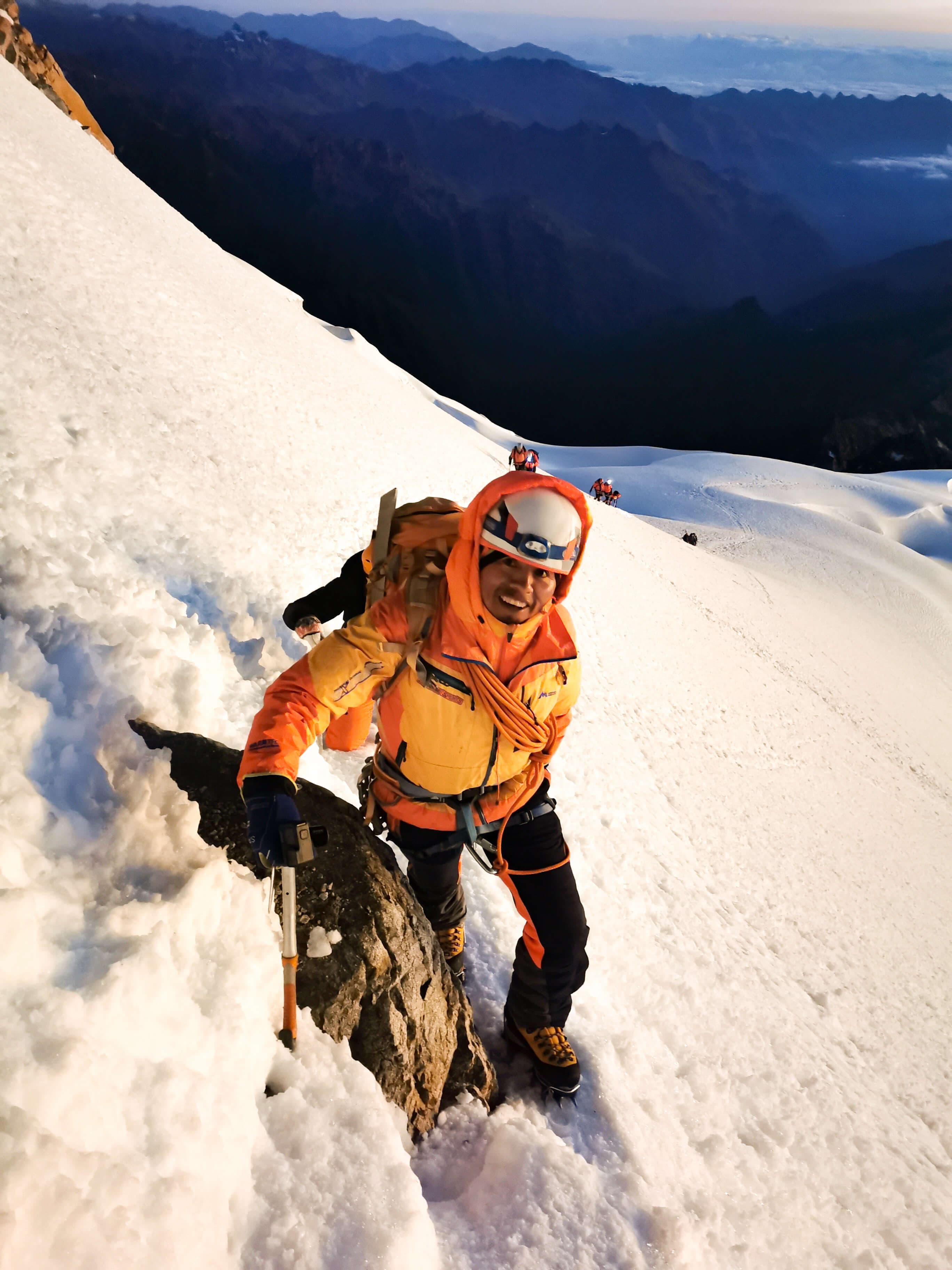 Climbing a snowy summit